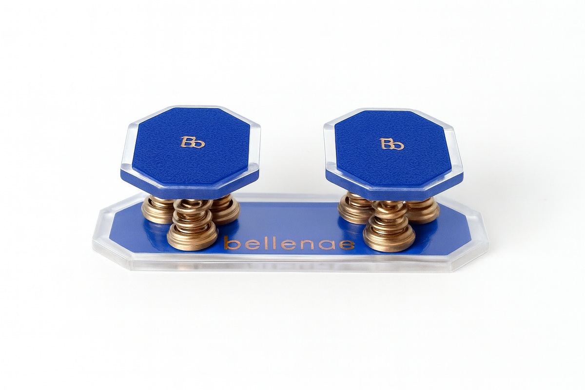 Bellenae Balancer two-foot spring balance board with royal blue mats on gold springs over a clear acrylic base